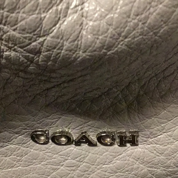 5 storage area like new leather Coach.   Second like it.  The other diff color. - Picture 2 of 5